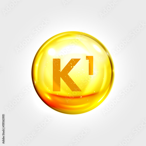 Vitamin K1 gold icon. Phylloquinone pill capsule