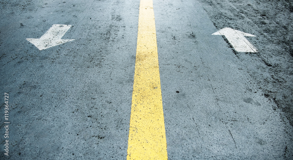 Fototapeta premium White arrow on the road