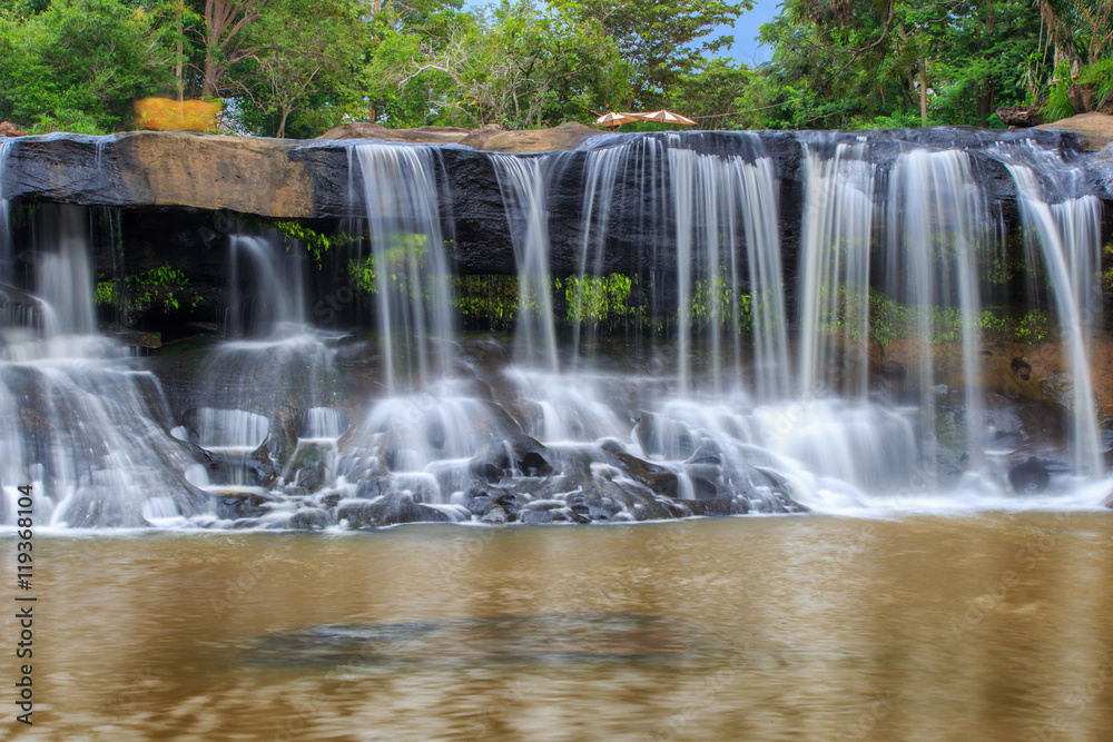 Tat Ton Waterfall, The beautiful waterfall in deep forest during raining  season at Tat Ton National Park, Ubon Ratchathani province, Thailand. Stock  Photo | Adobe Stock