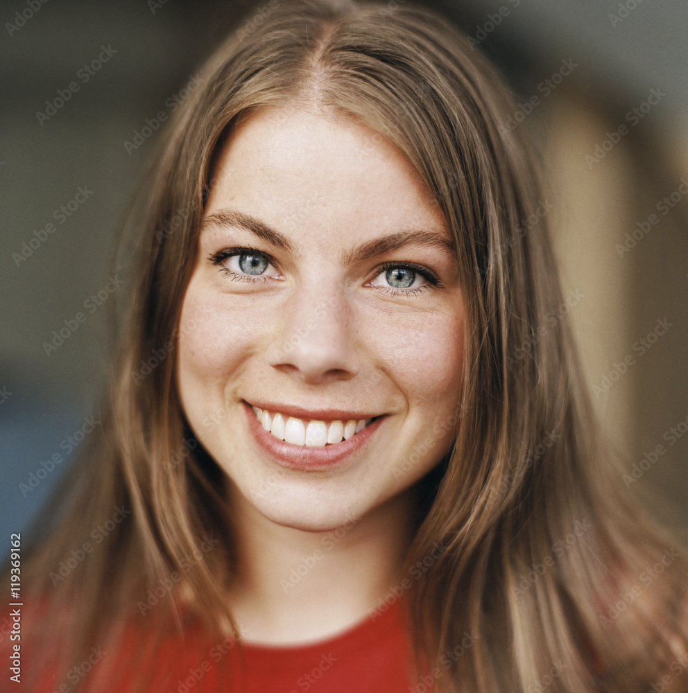 Portrait of a smiling woman.