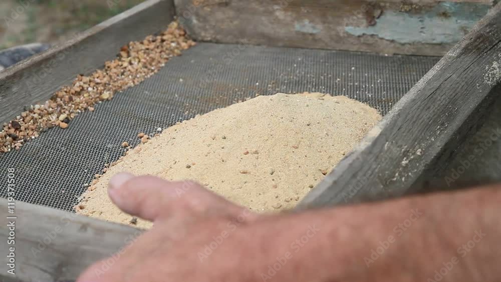Sifting sand through a sieve
