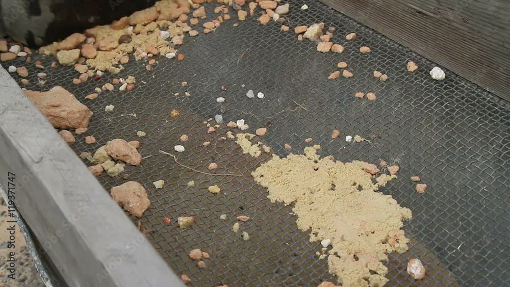 Sifting sand through a sieve