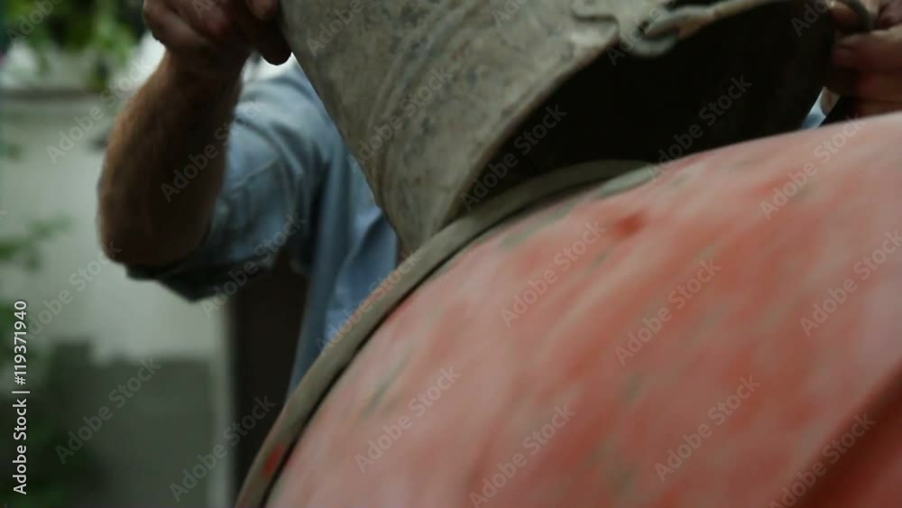 Retired manufactures concrete using a concrete mixer