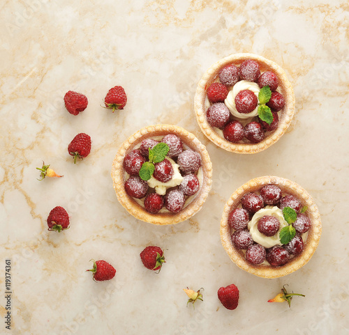 cake basket with fresh raspberries and cream fruit dessert