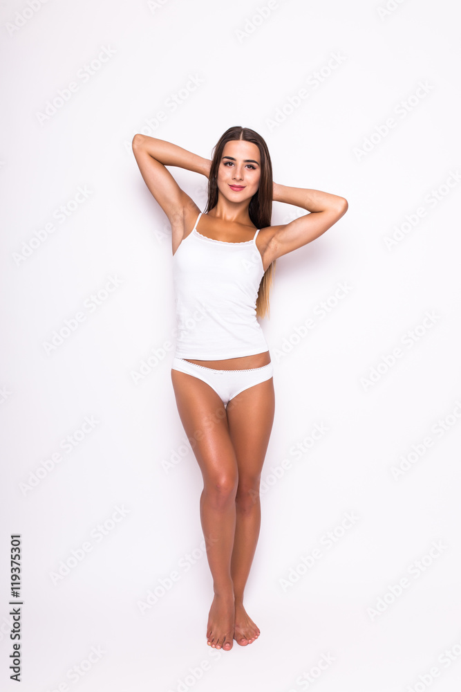 Young beauty girl in white lingerie on white. Body care. Young beauty girl in white lingerie on white. Body care.