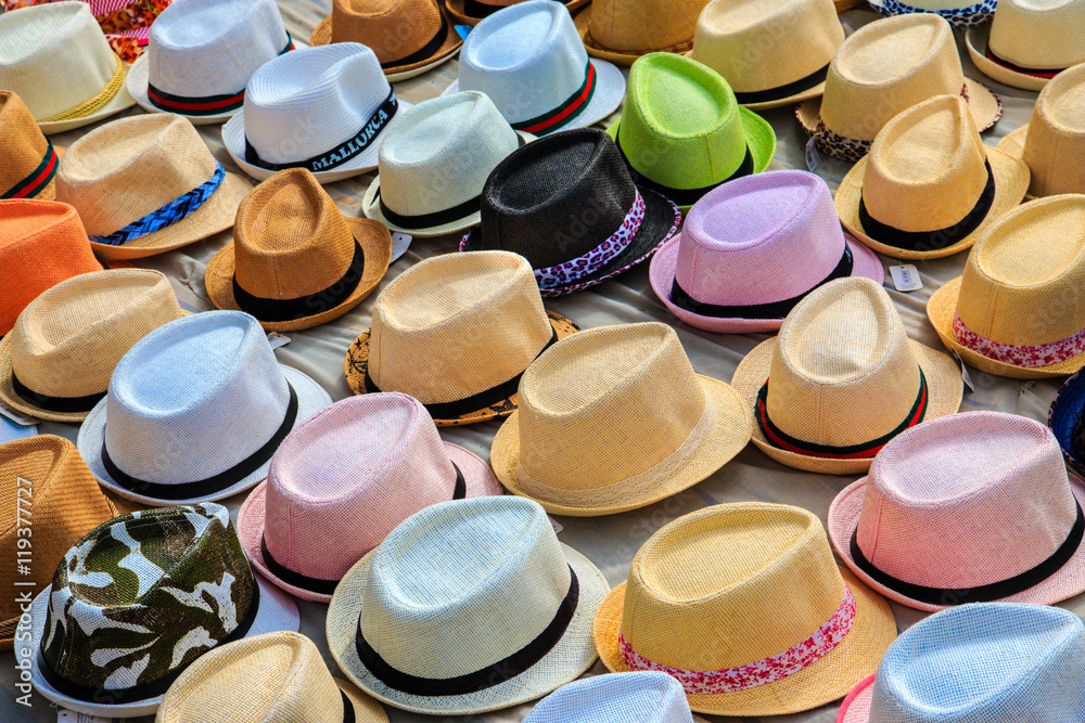Europe, Spain, Balearic Islands, Mallorca, Palma de Mallorca, hats for sale in street market.
