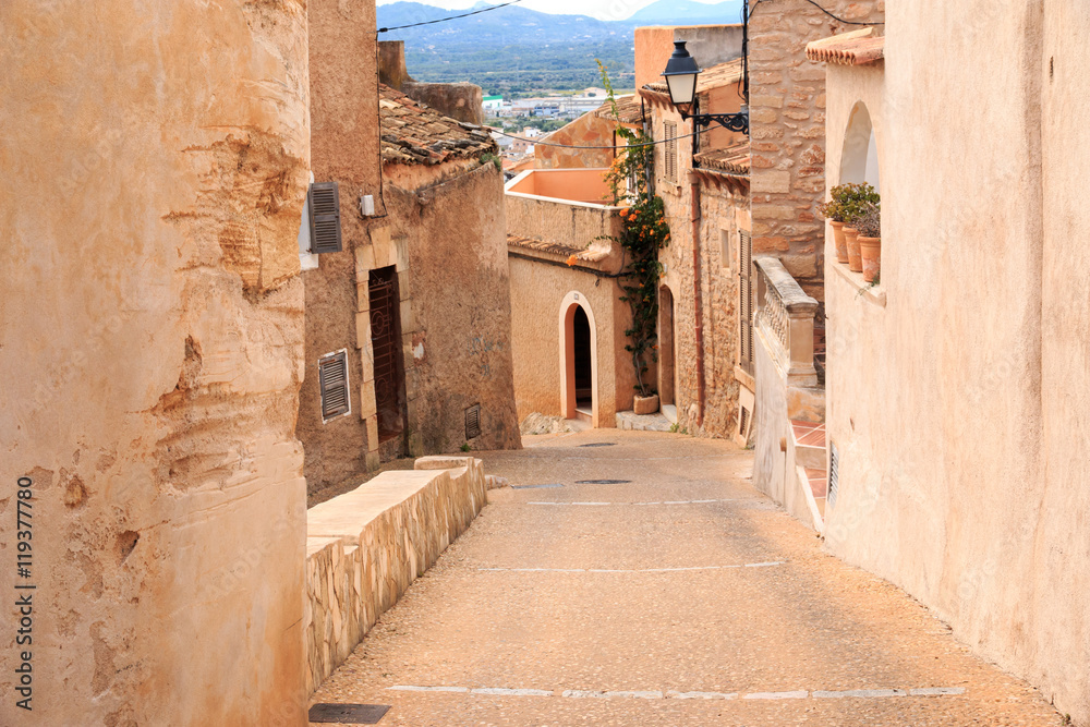 Europe, Spain, Balearic Islands, Mallorca, Arta. Stone houses and old streets near castle fortress.