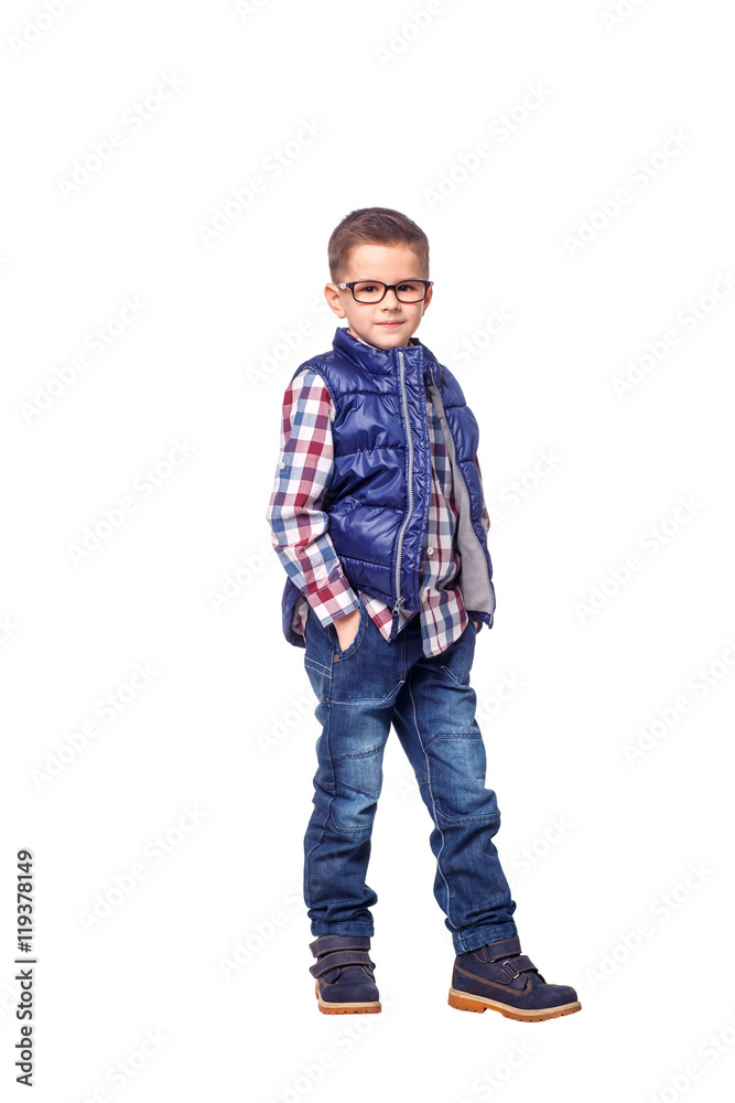 Boy in autumn clothes posing on white background. Boy in autumn clothes posing on white background.