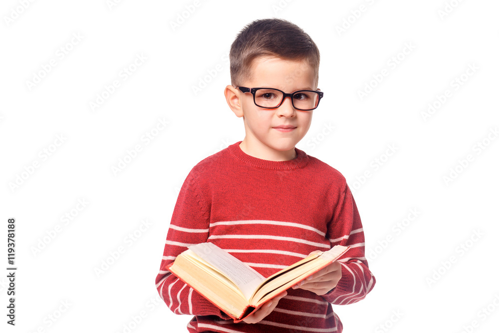 Child student with a book isolated over white background. Child student with a book isolated over white background.