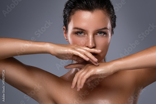 Beautiful woman with oily and wet skin