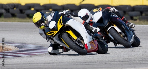 Mototbikes Racing on Track