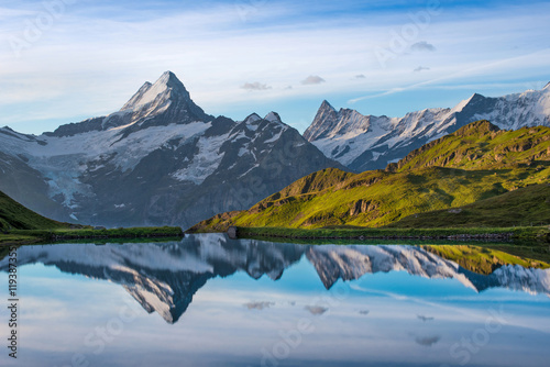 Obraz na płótnie Fantastic landscape at sunrise over the lake in the Swiss Alps, w salonie