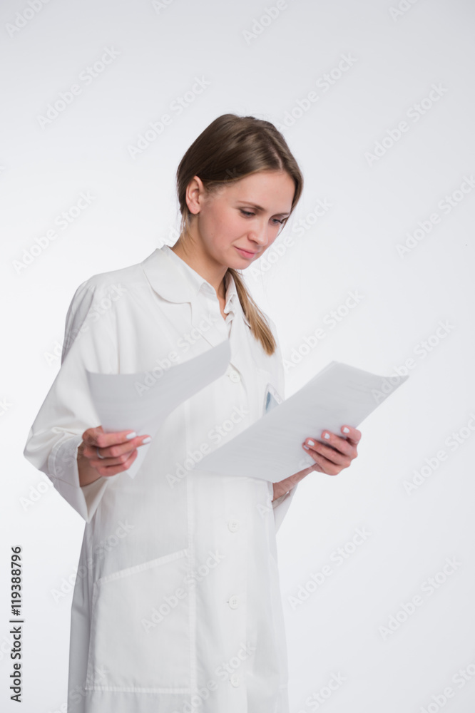 Portrait of cheerful female doctor with documents, isolated over white background Portrait of cheerful female doctor with documents, isolated over white background