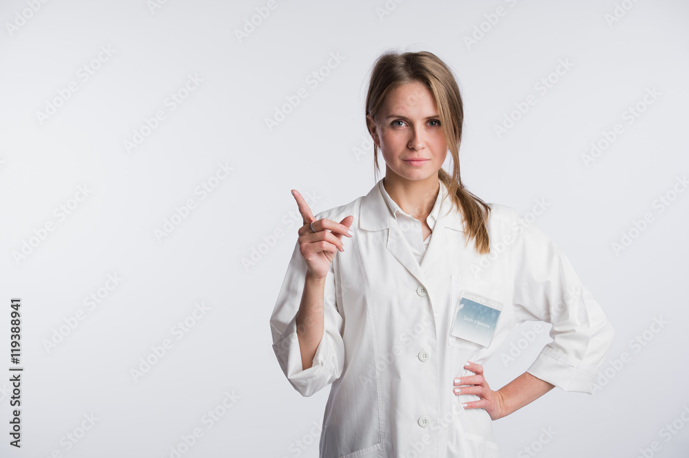 Young doctor woman nurse presenting and showing copy space for product or text. Caucasian female medical professional isolated on white background. Young doctor woman nurse presenting and showing copy space for product or text. Caucasian female medical professional isolated on white background.