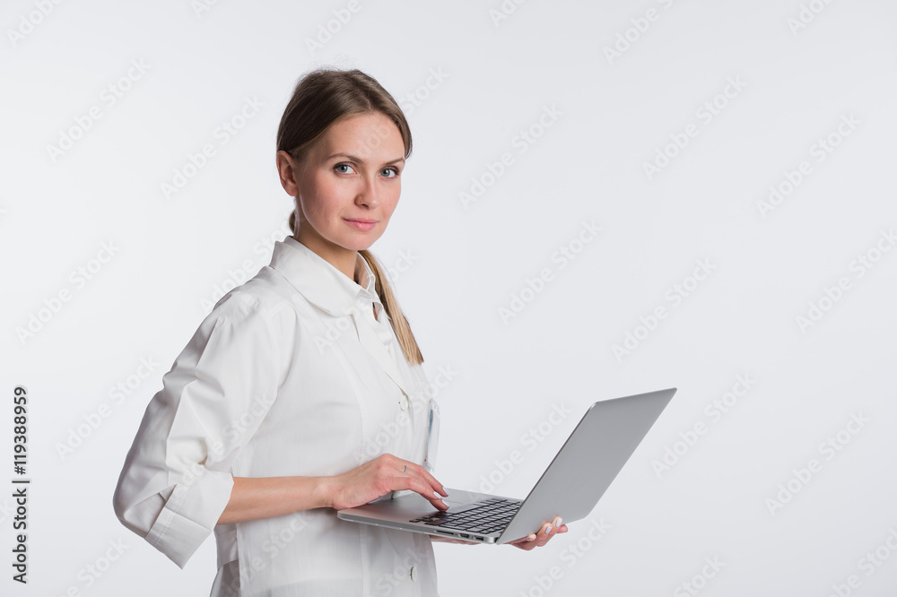 medical doctor woman smile hold tablet pc, using computer. nurse with stethoscope Isolated over white background medical doctor woman smile hold tablet pc, using computer. nurse with stethoscope Isolated over white background