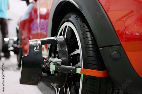 Wallpaper Mural Wheel alignment equipment on a car wheel Torontodigital.ca