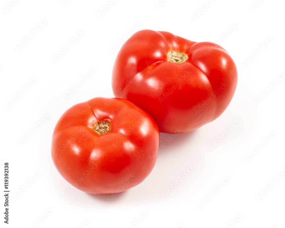A tomato. Red tomato on a white background. Harvest vegetables. Autumn harvest. Red, juicy, ripe tomato. A tomato. Red tomato on a white background. Harvest vegetables. Autumn harvest. Red, juicy, ripe tomato.