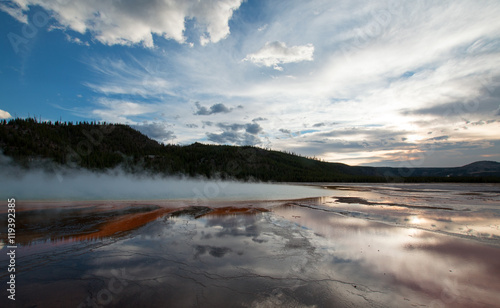 The Grand Prismatic Spring at sunset along the Firehole River in Yellowstone National Park in Wyoming USA