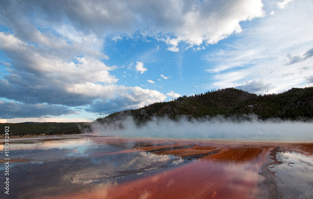 The Grand Prismatic Spring during evening sunset in the Midway Geyser Basin along the Firehole River in Yellowstone National Park in Wyoming United States