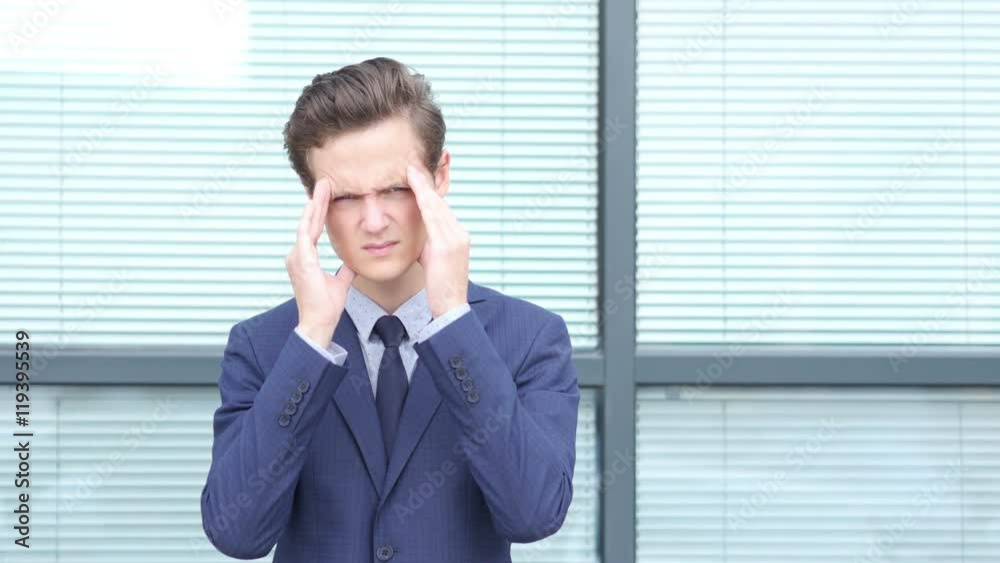 Headache, Upset Gesture by Young Businessman Headache, Upset Gesture by Young Businessman