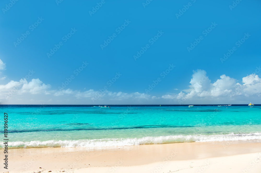 Beautiful marine view on sea coast line with clean wavy surf water on sandy beach