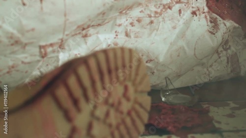 Laboratory immediately after the grenade explosion. On the floor of the remains of bodies in white kombenizony, masks, body parts and flesh amid the smoke and fire.