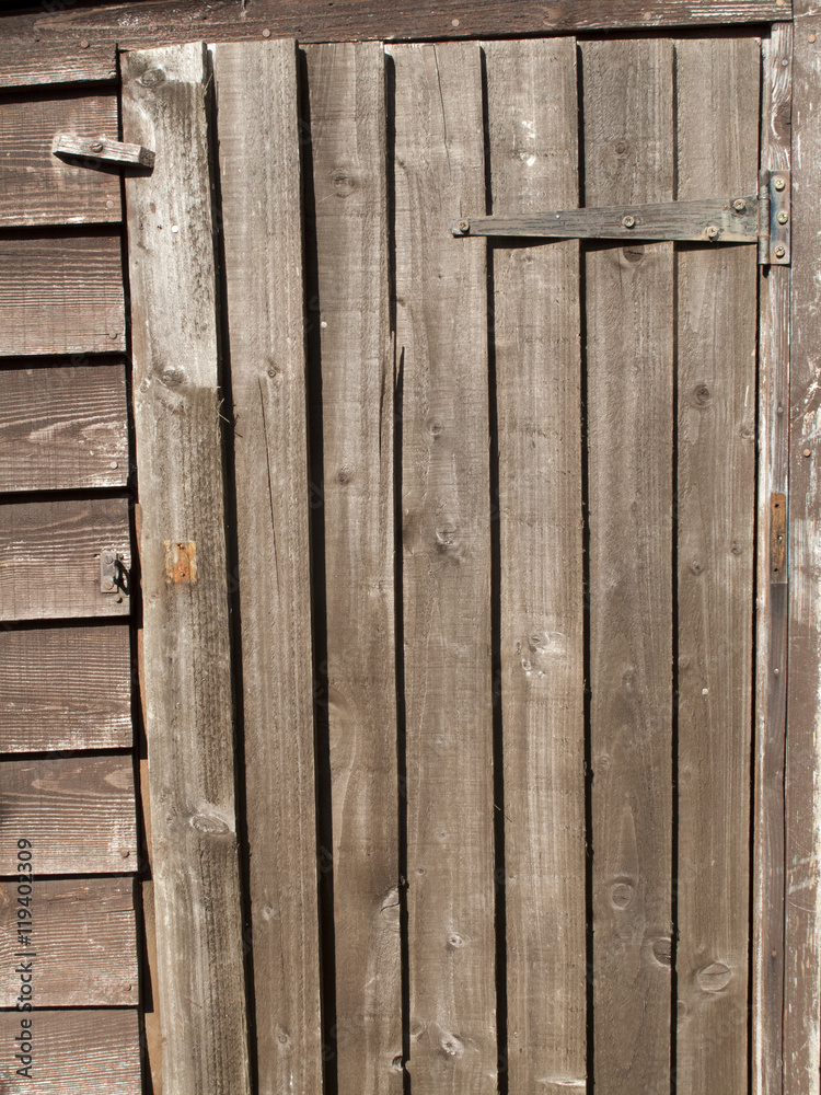 Door to old garden timber plank shed Door to old garden timber plank shed