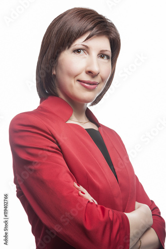 Businesswoman in Red Suit Posing Against White Background.