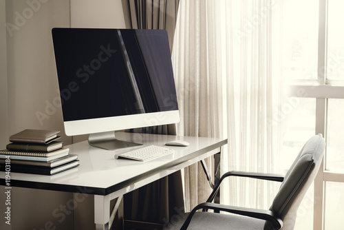 Blank computer desktop with keyboard, diary and other accesories © sirastock