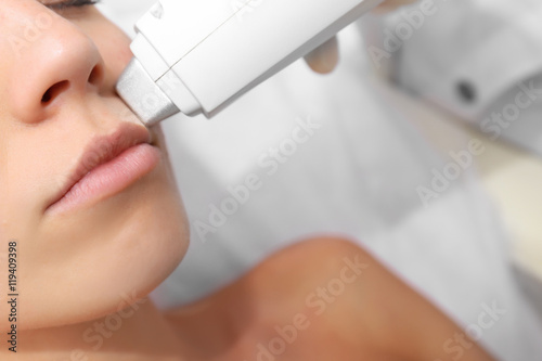 Woman getting laser treatme...