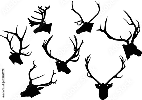 set of seven black deer heads on white