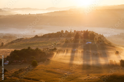 Misty morning sunrise in Khao Takhian Ngo View Point at Khao-kho