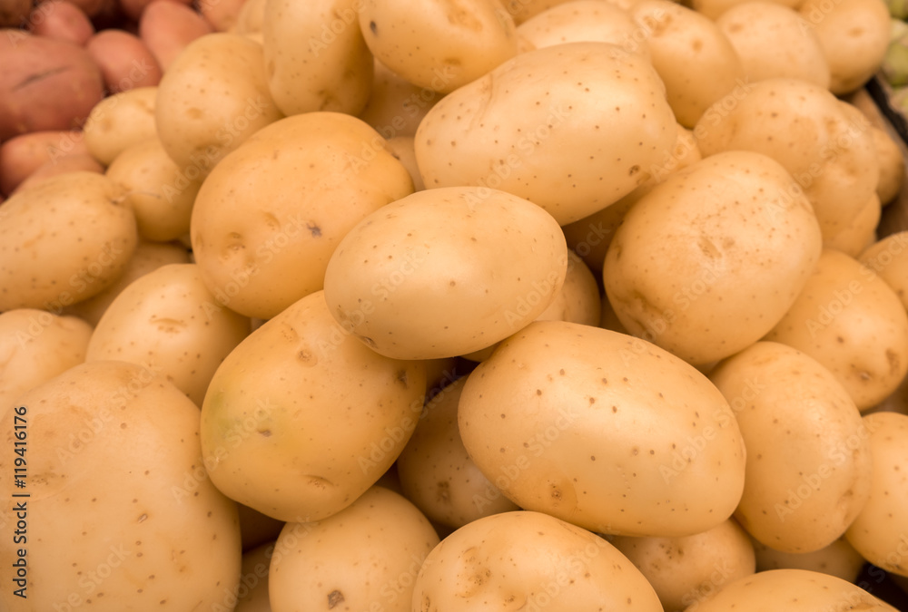 The new harvest potatoes at local farm market The new harvest potatoes at local farm market