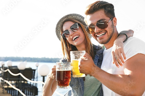Couple hanging out with bee...