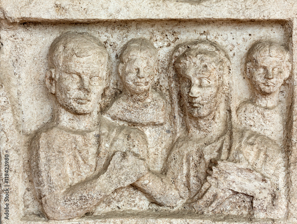 Relief on the ancient sarcophagus in the baths of Diocletian in Rome. Italy