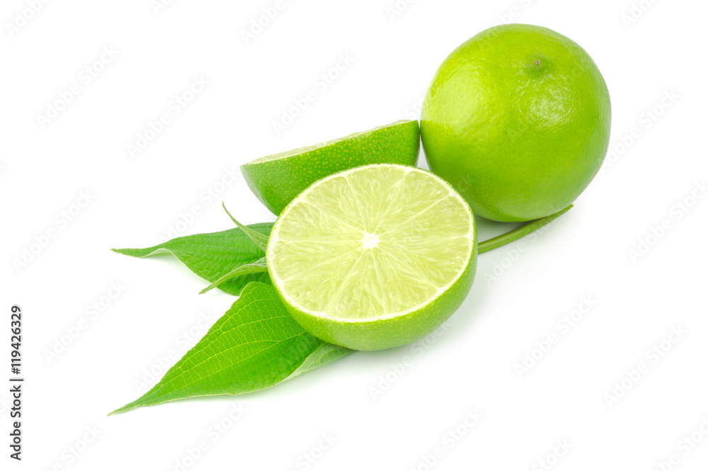 Two halves and whole lime isolated on white with leaves Two halves and whole lime isolated on white with leaves