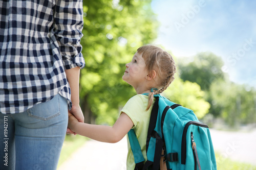 Mother taking daughter to school © Africa Studio