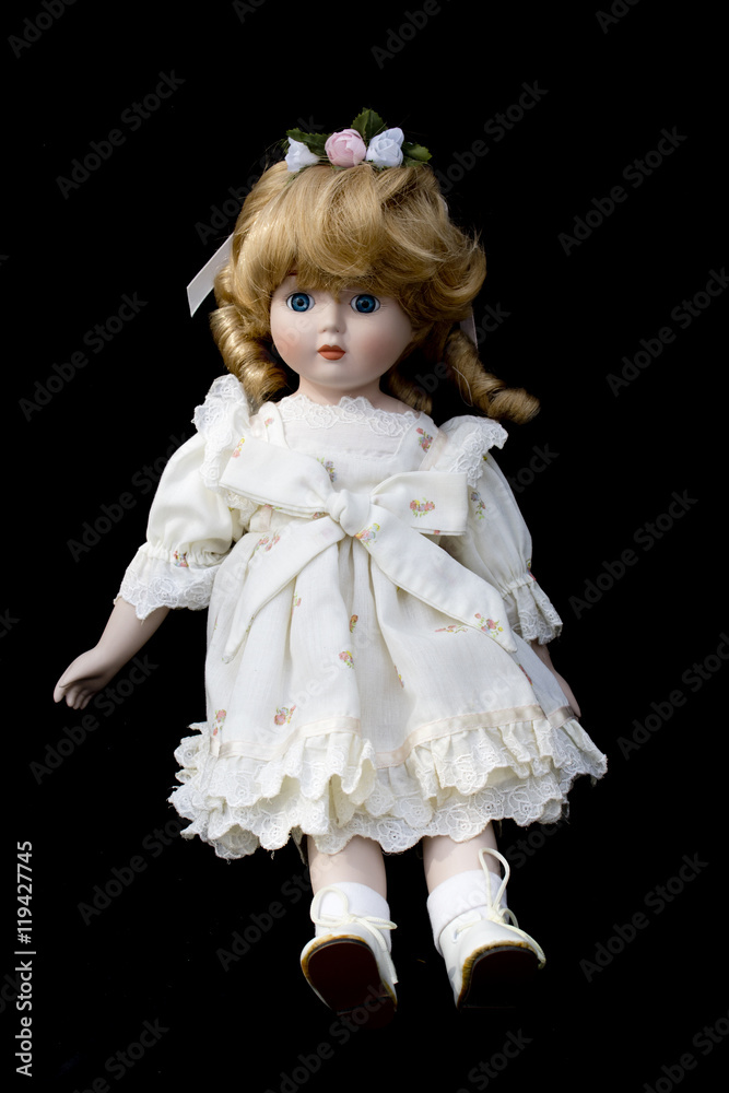 Close Up and Isolated Vintage Antique Old Doll