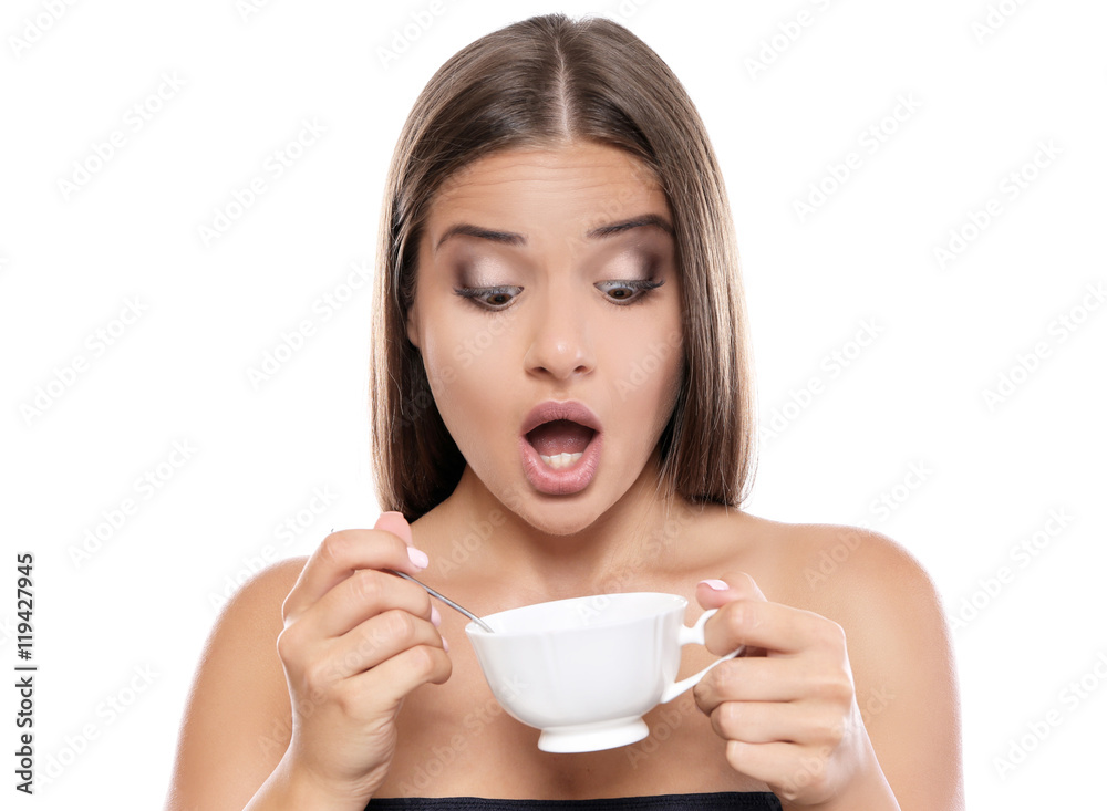 Beautiful young woman drinking coffee on white background Beautiful young woman drinking coffee on white background