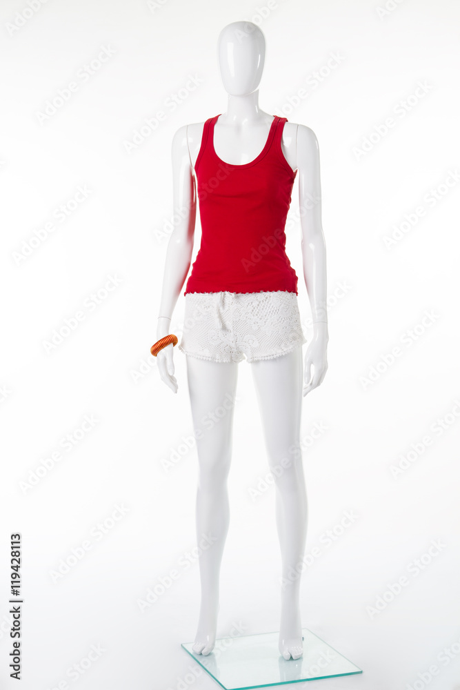 White mannequin in vinous shirt and knitted lace shorts. White mannequin in vinous shirt and knitted lace shorts.