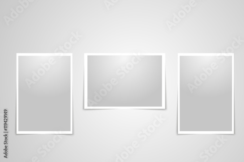 Vector posters template of a papers sheet. Mock ups. Templates . Blank in light frames hanging with clips on background .