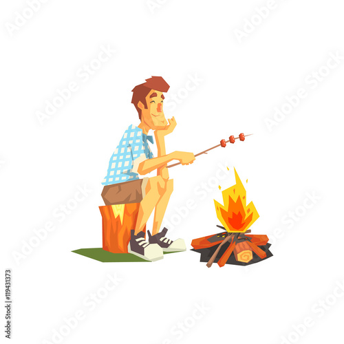 Guy Frying Meat On Camp Bonfire