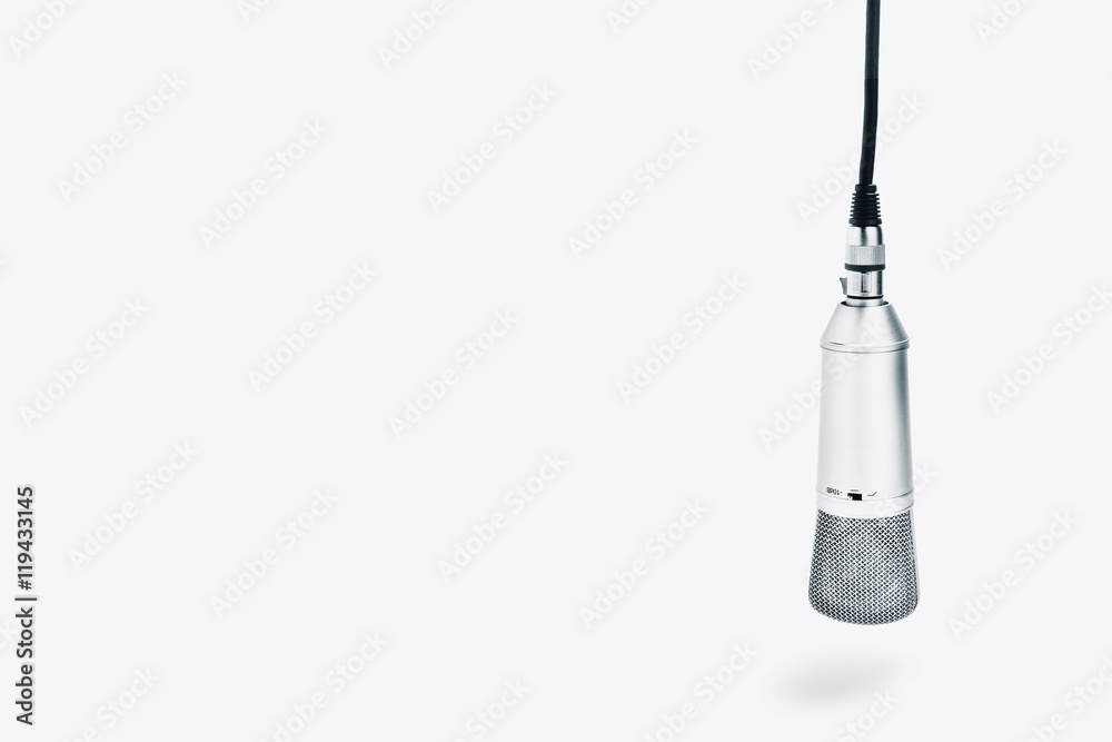 An isolated studio microphone on a white background An isolated studio microphone on a white background