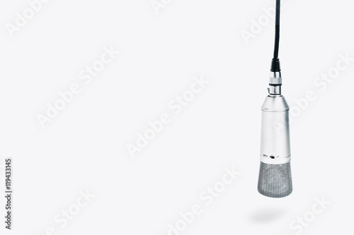 An isolated studio microphone on a white background