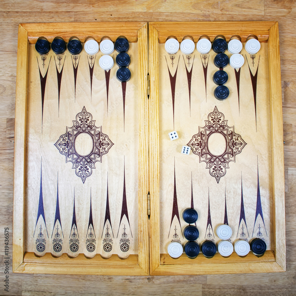 Game field in a backgammon with cubes and counters. Game concept Stock ...