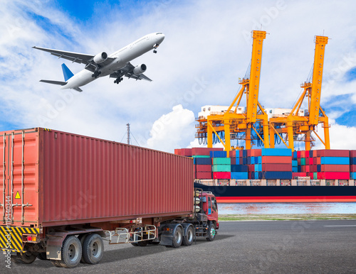 Truck transport container and cago plane flying above ship port