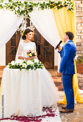 beautiful caucasian couple just married. Wedding ceremony