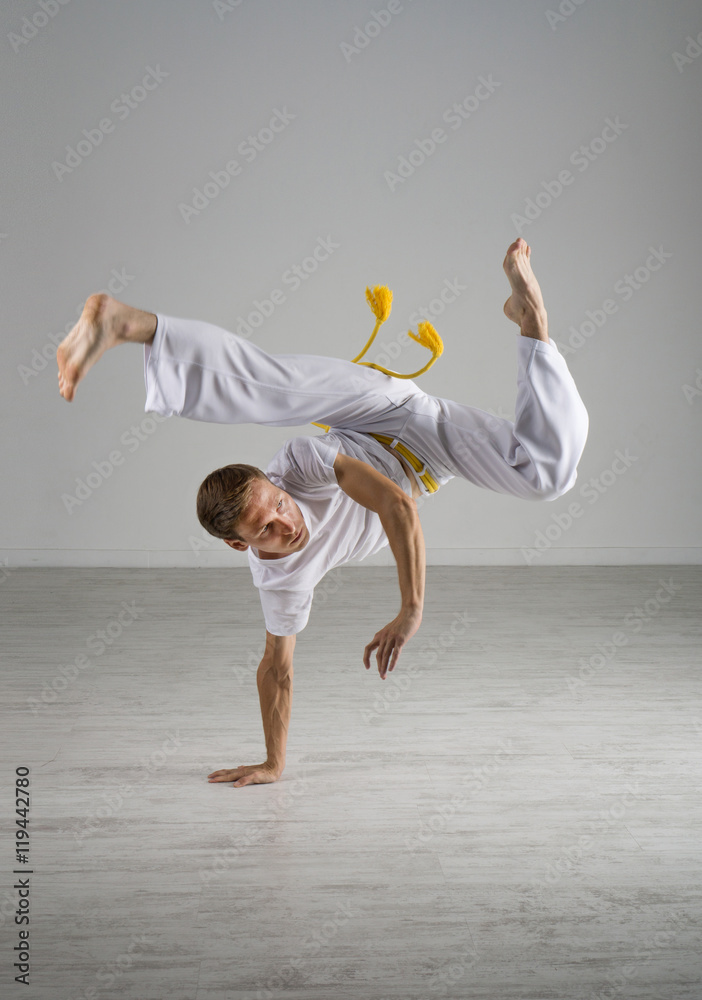 Man practicing Capoeira , brazilian martial Art.