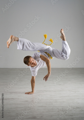 Man practicing Capoeira , brazilian martial Art.