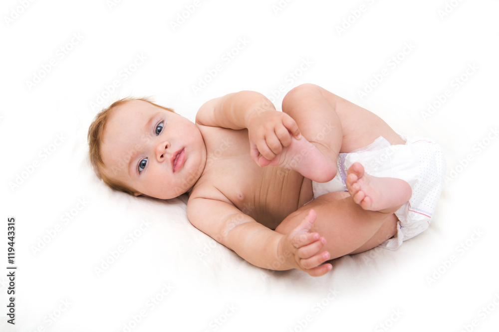 Funny little baby lying down on a blanket . Newborn child relaxing in bed. Nursery for young children. Textile and bedding for kids.
Funny little baby lying down on a blanket . Newborn child relaxing in bed. Nursery for young children. Textile and bedding for kids.